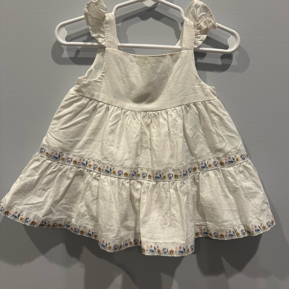 White Ruffled Baby Dress with Floral Trim